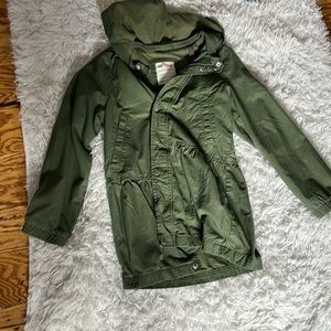 Green jacket cat and jack